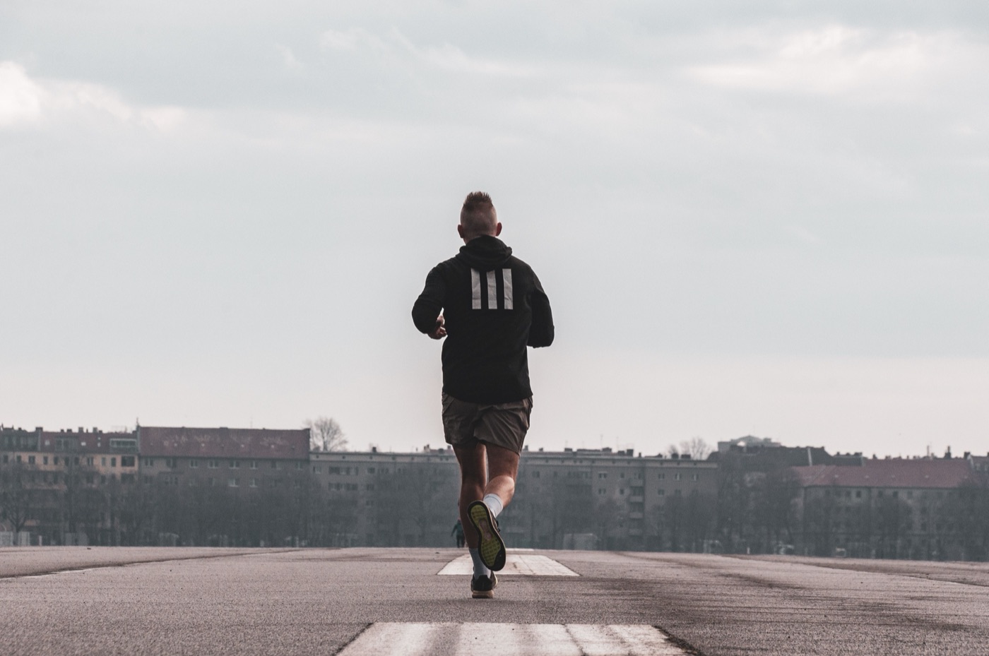 A man training alone in the early morning, doing the work that does not announce itself.